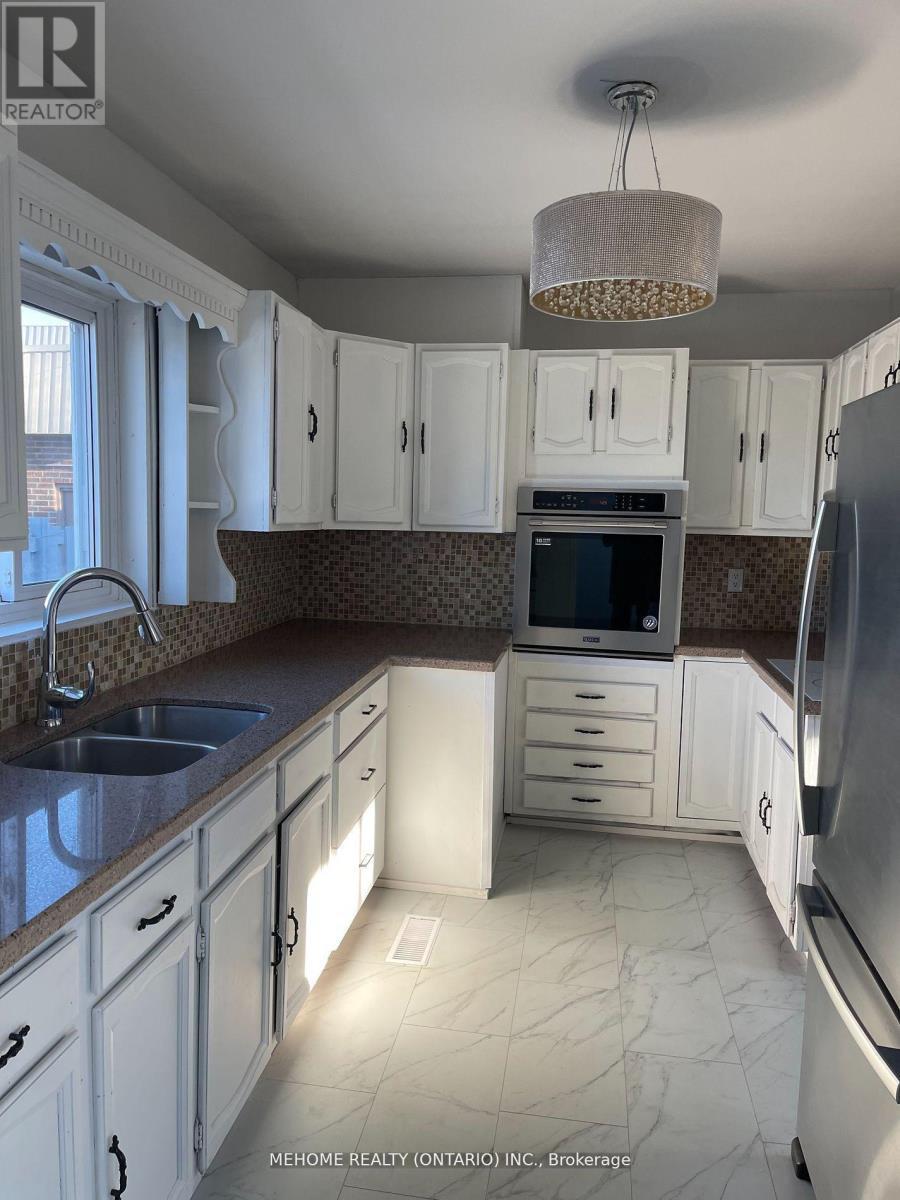 Main - 83 Cornwallis Drive, Toronto, ON - Indoor Photo Showing Kitchen With Double Sink