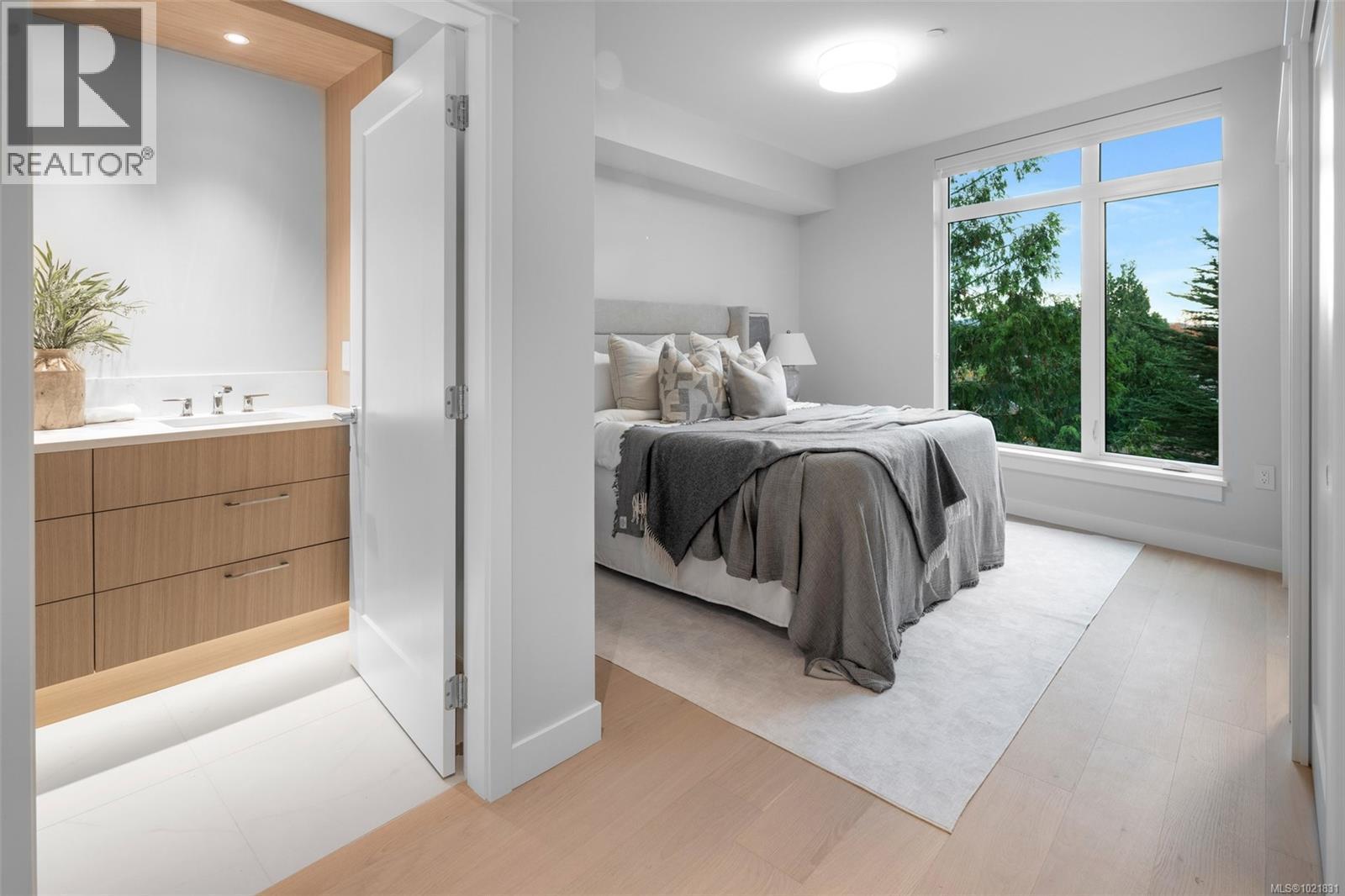 Show suite image used for finishings reference. Layout differs in the listed unit. - 206 5229 Cordova Bay Rd, Saanich, BC - Indoor Photo Showing Bedroom