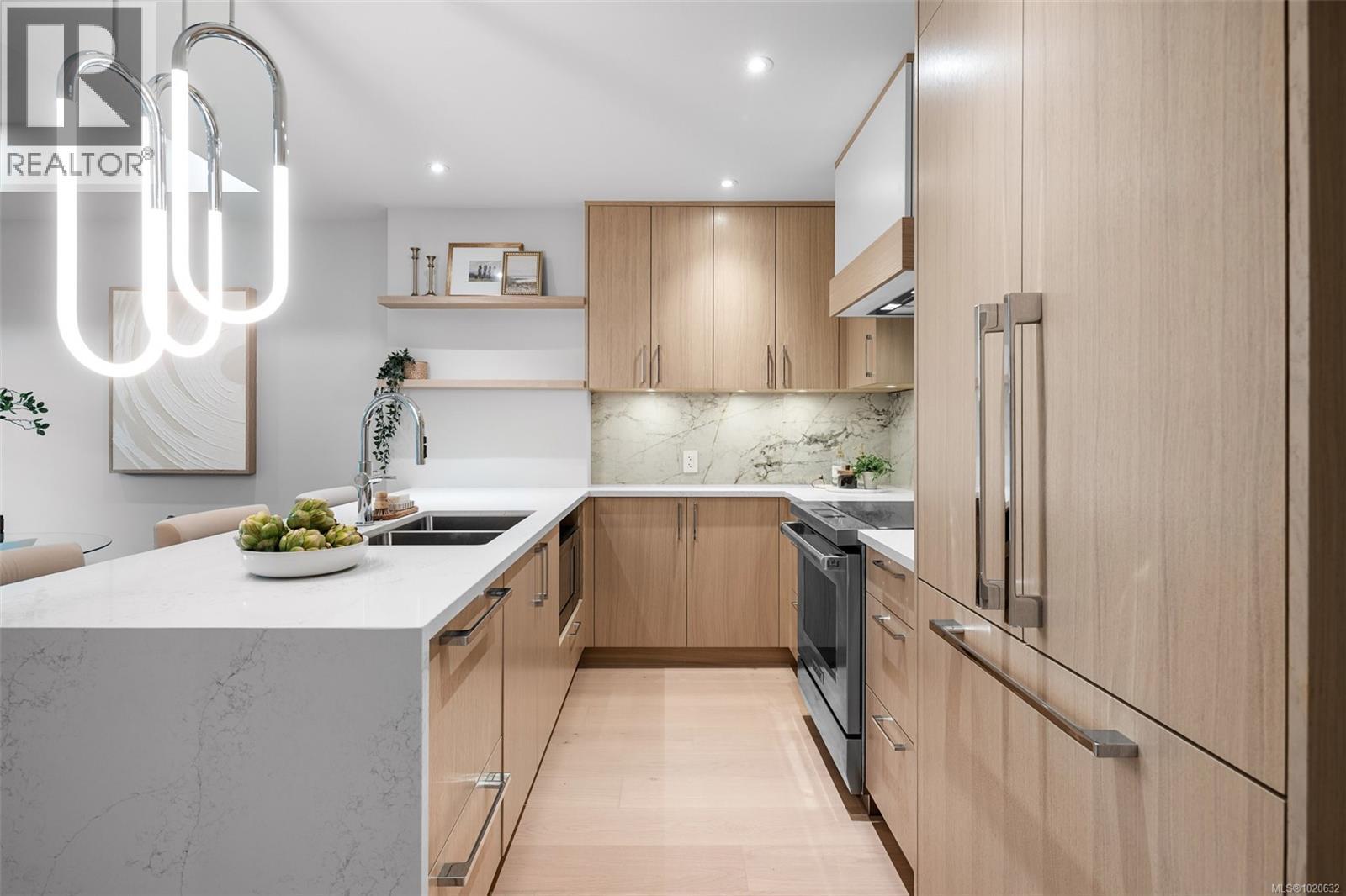 204 5229 Cordova Bay Rd, Saanich, BC - Indoor Photo Showing Kitchen With Double Sink With Upgraded Kitchen