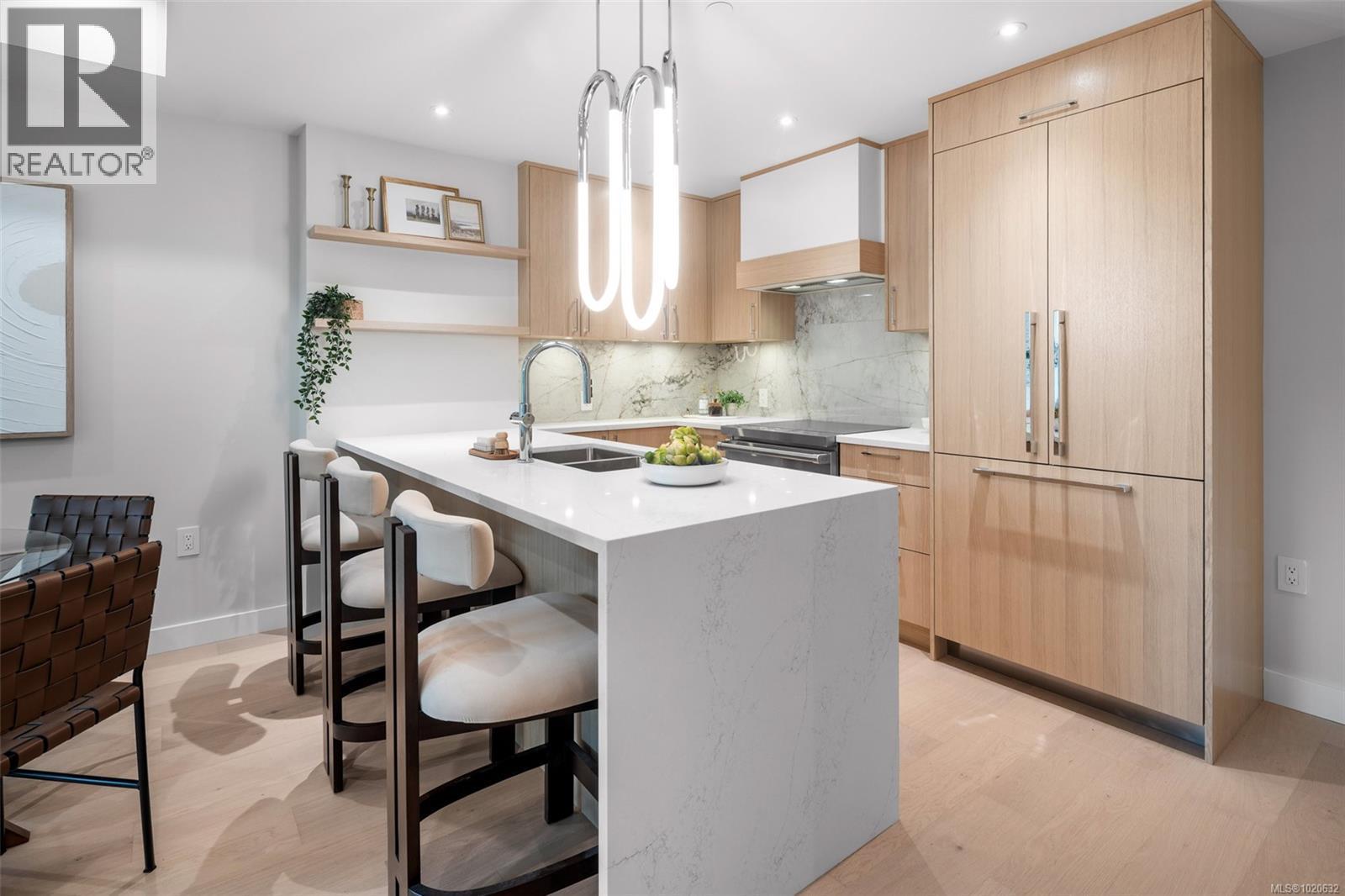 204 5229 Cordova Bay Rd, Saanich, BC - Indoor Photo Showing Kitchen With Double Sink With Upgraded Kitchen