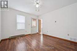 Living room facing laundry room -