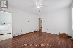 Living room to kitchen and stairs -