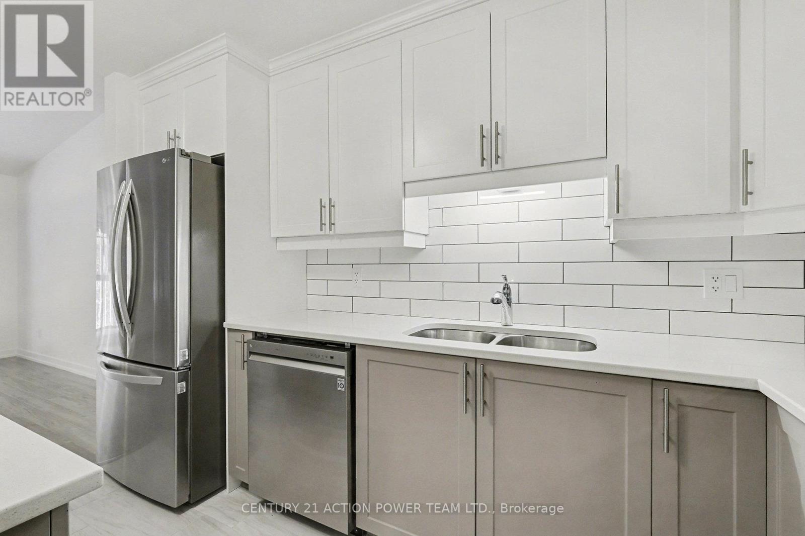 99 St Moritz Trail E, Russell, ON - Indoor Photo Showing Kitchen With Stainless Steel Kitchen With Double Sink