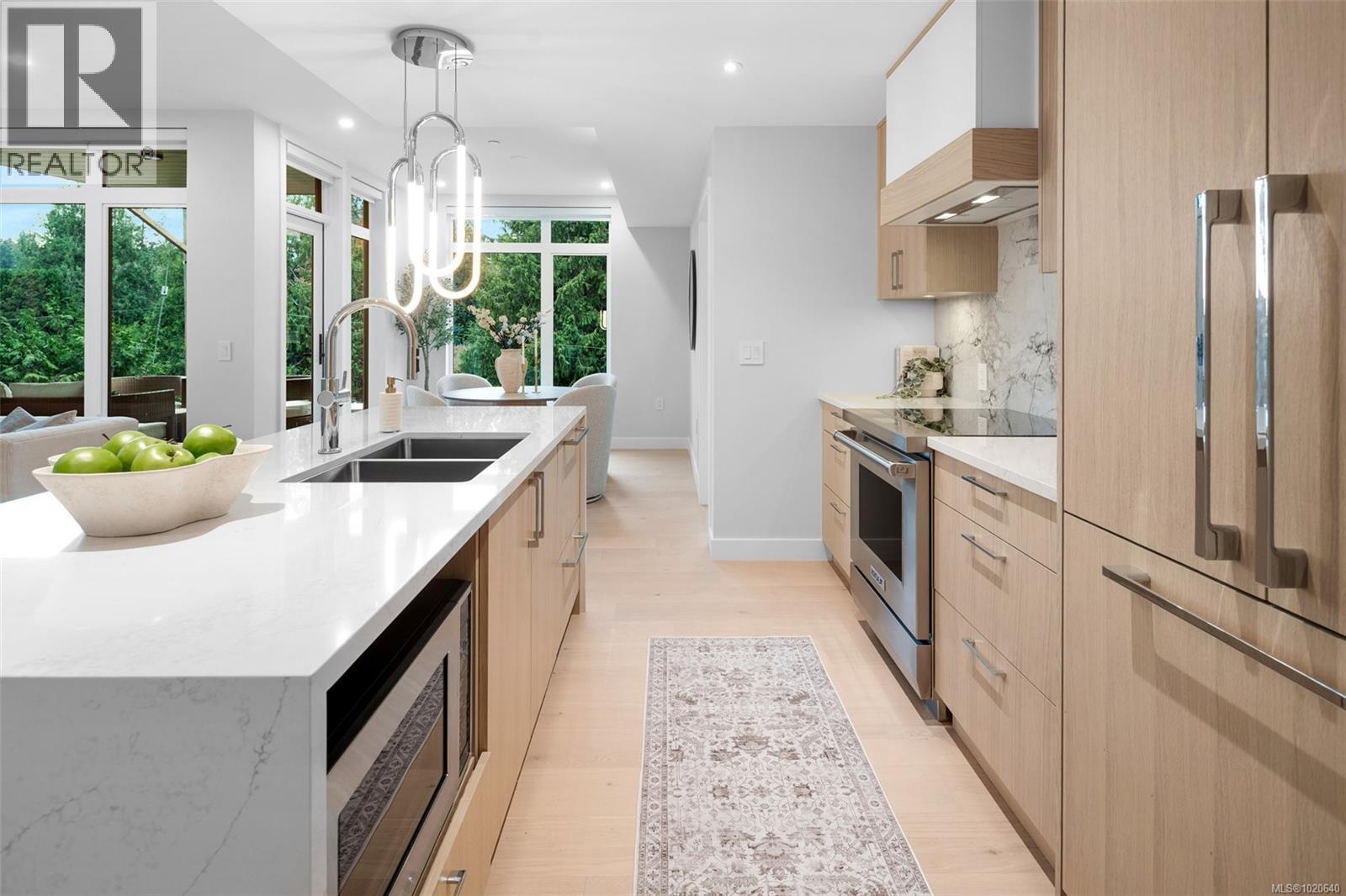 303 5229 Cordova Bay Rd, Saanich, BC - Indoor Photo Showing Kitchen With Double Sink With Upgraded Kitchen