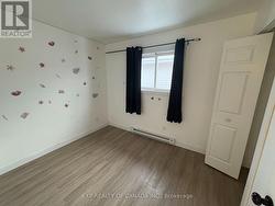 Main Floor Bedroom #1 -