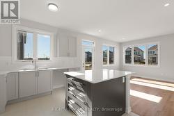 Kitchen- Island Overlooking Dining Rm -