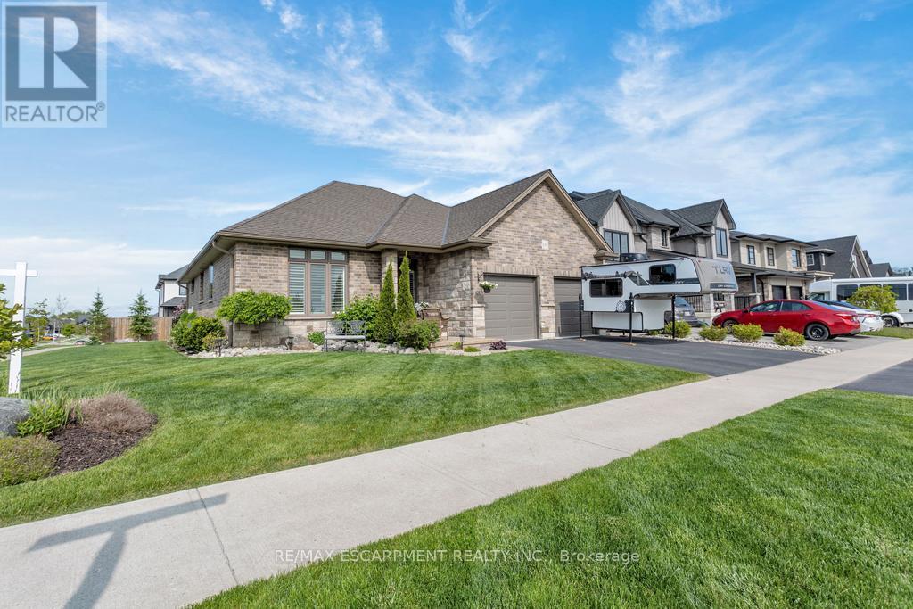 100 Tamarack Boulevard, Woodstock, ON - Outdoor With Facade