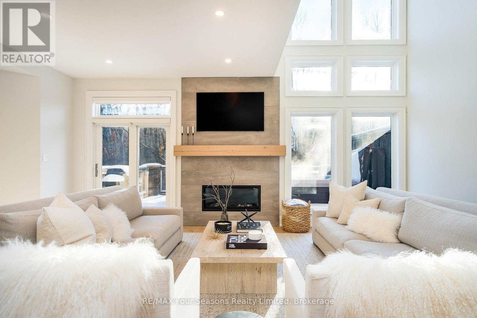 58 - 204 Blueski George Crescent, Blue Mountains, ON - Indoor Photo Showing Living Room With Fireplace