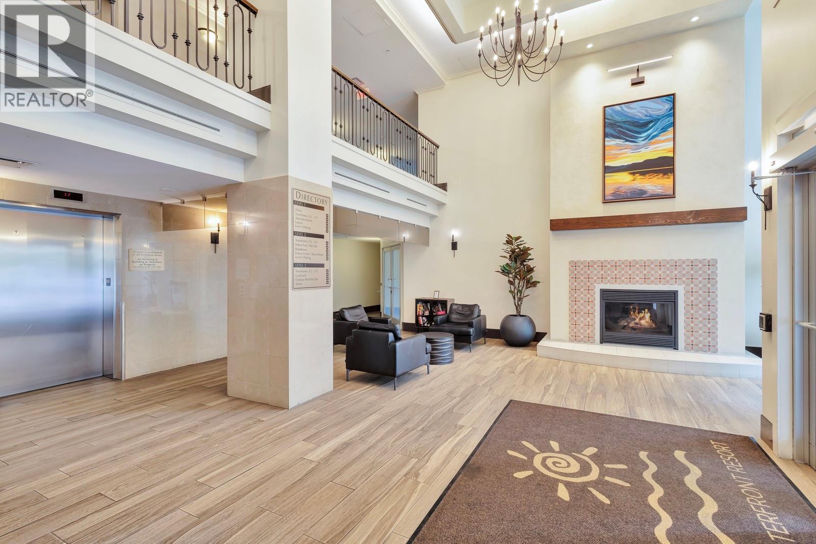 Building Entrance - 1128 Sunset Drive Unit# 803, Kelowna, BC - Indoor With Fireplace