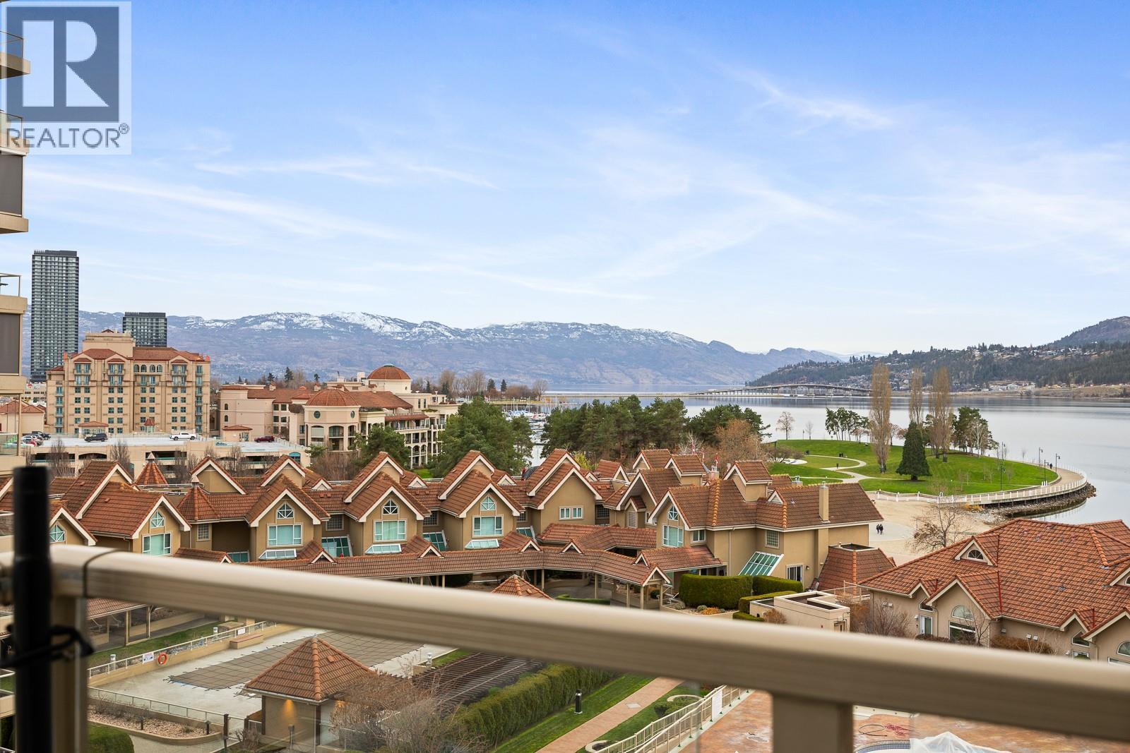 Stunning Lake, Lagoon, and Mountain Views Right From Your Balcony - 1128 Sunset Drive Unit# 803, Kelowna, BC - Outdoor With Body Of Water With View