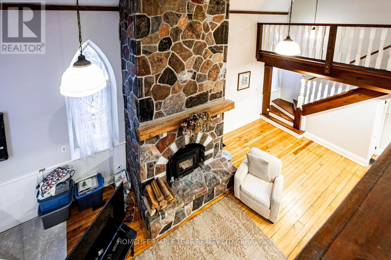 10 Mill Street, Amaranth, ON - Indoor Photo Showing Other Room With Fireplace
