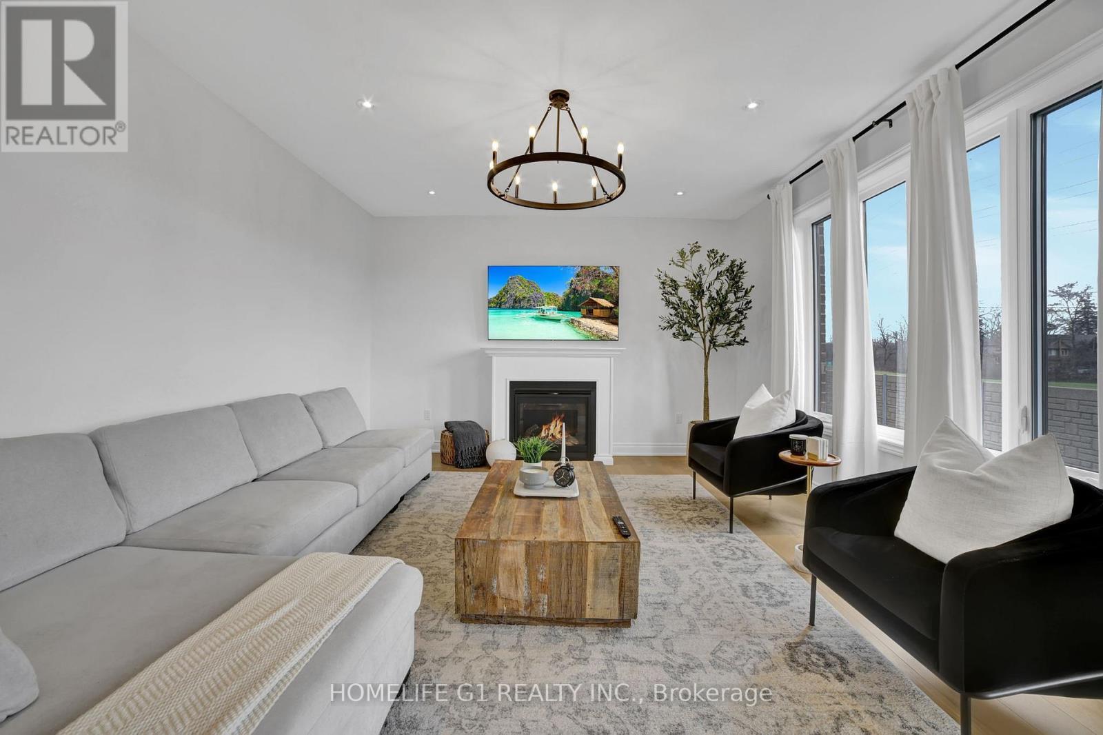 24 Cesar Place, Hamilton, ON - Indoor Photo Showing Living Room With Fireplace