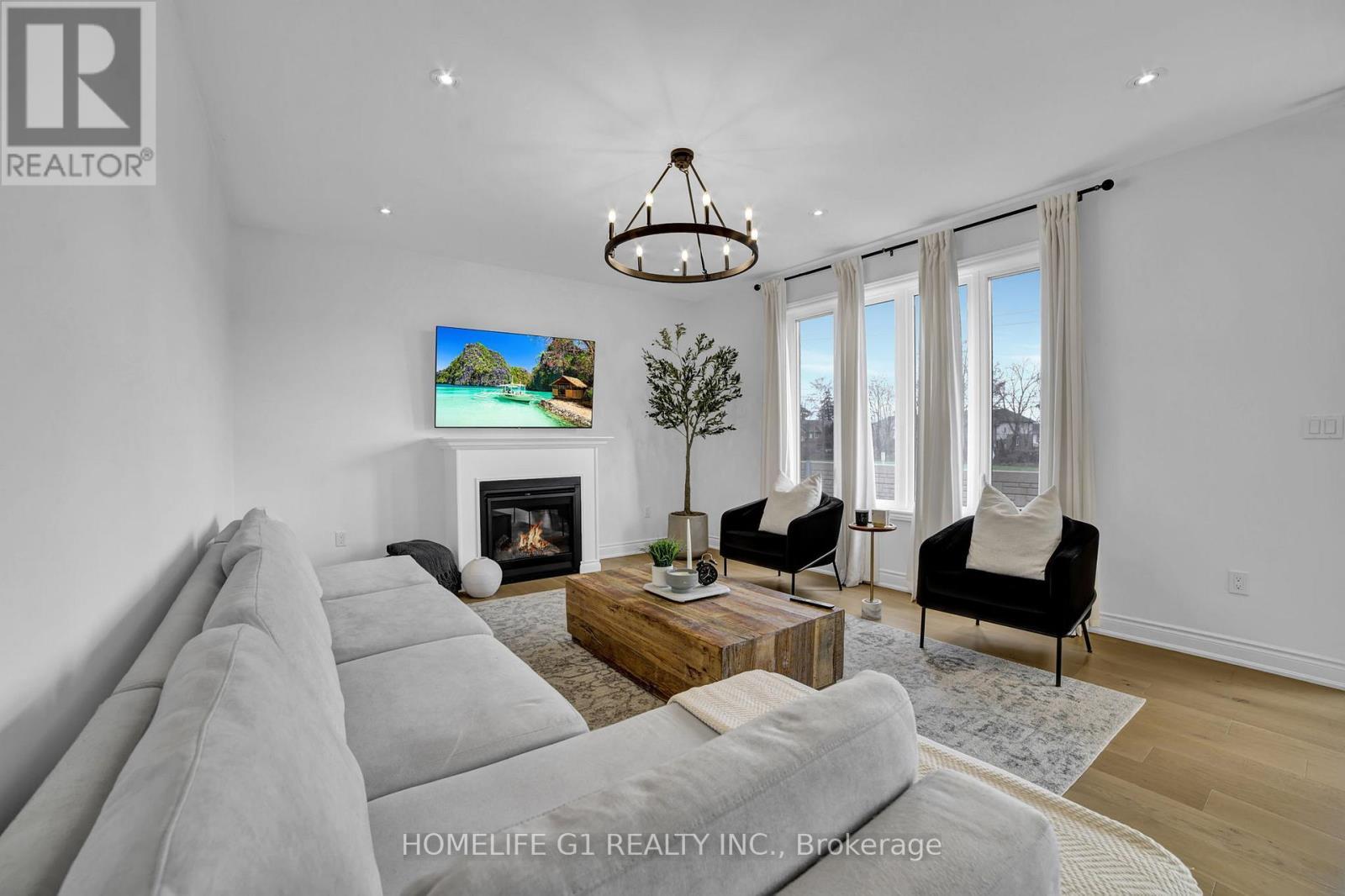 24 Cesar Place, Hamilton, ON - Indoor Photo Showing Living Room With Fireplace