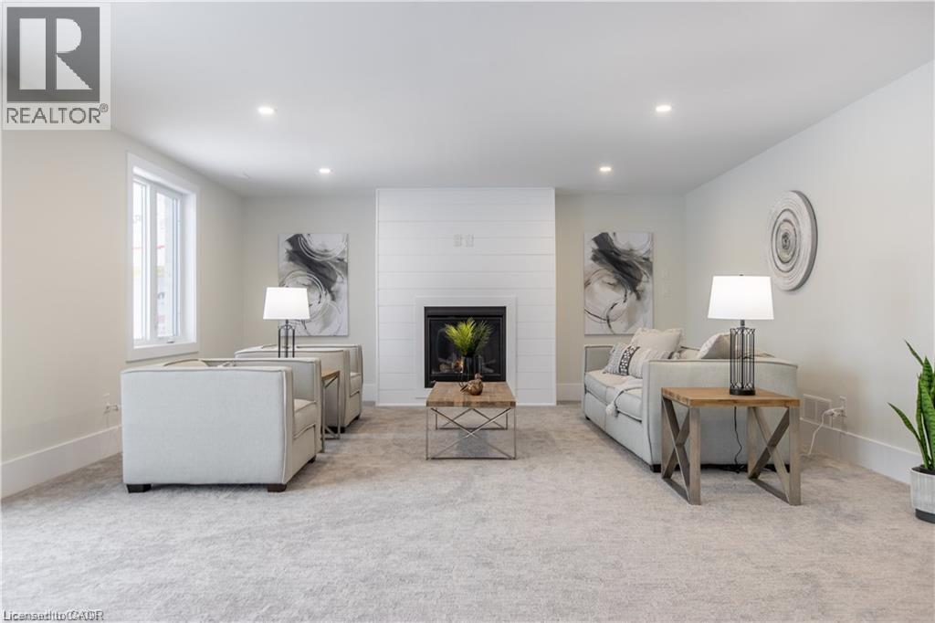 Lot 2 Avery Place, Milverton, ON - Indoor Photo Showing Living Room With Fireplace