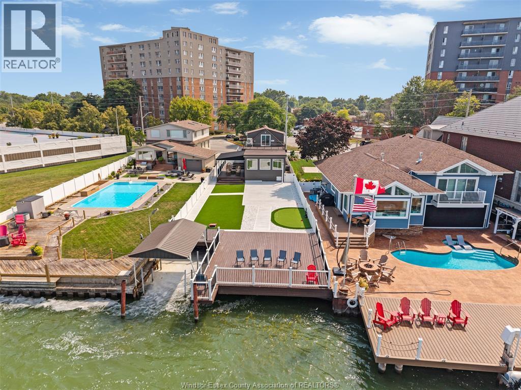 8830 Riverside Drive East, Windsor, ON - Outdoor With In Ground Pool With Deck Patio Veranda
