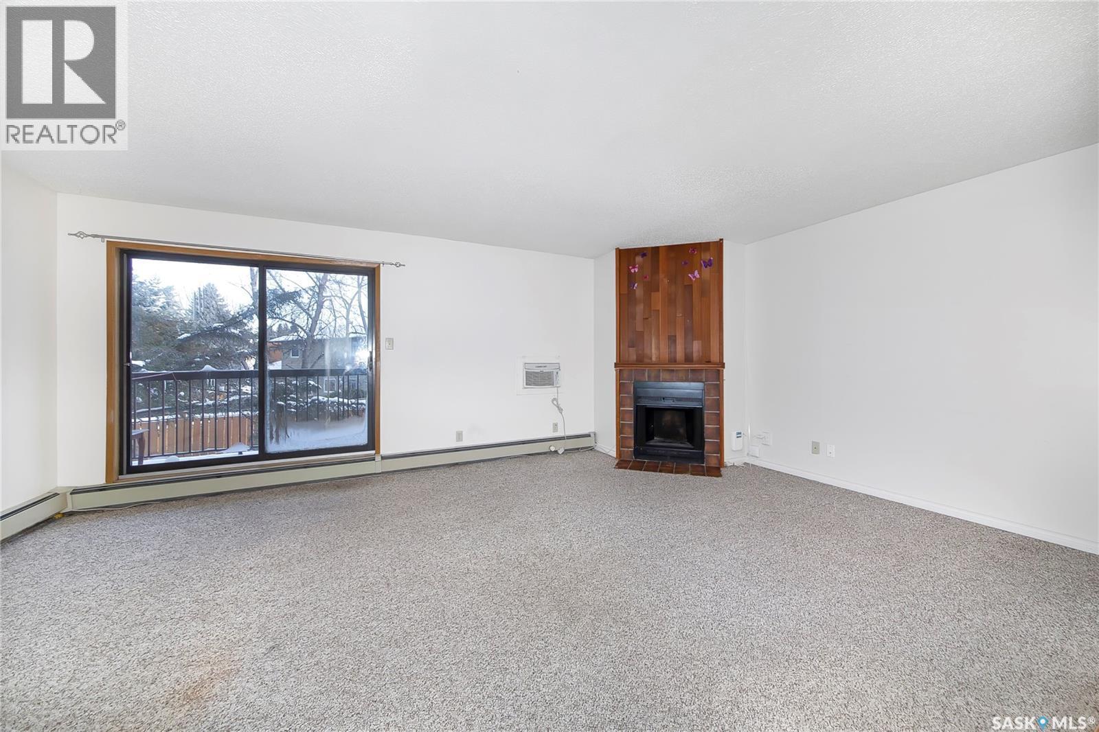 103 205 Kingsmere Boulevard, Saskatoon, SK - Indoor With Fireplace