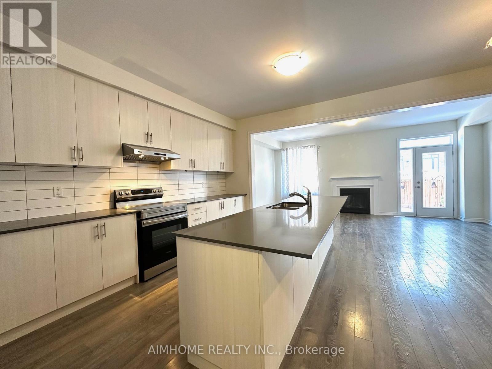 21 Viola St. Street, East Gwillimbury, ON - Indoor Photo Showing Kitchen With Fireplace