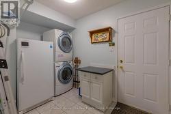 Laundry and entrance to double garage. -
