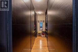 Walk in closet with built in storage. -