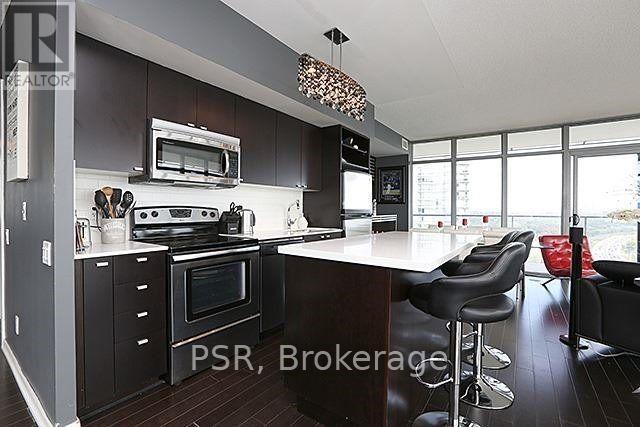 Open Modern Kitchen - 2104 - 103 The Queens Way, Toronto, ON - Indoor Photo Showing Kitchen