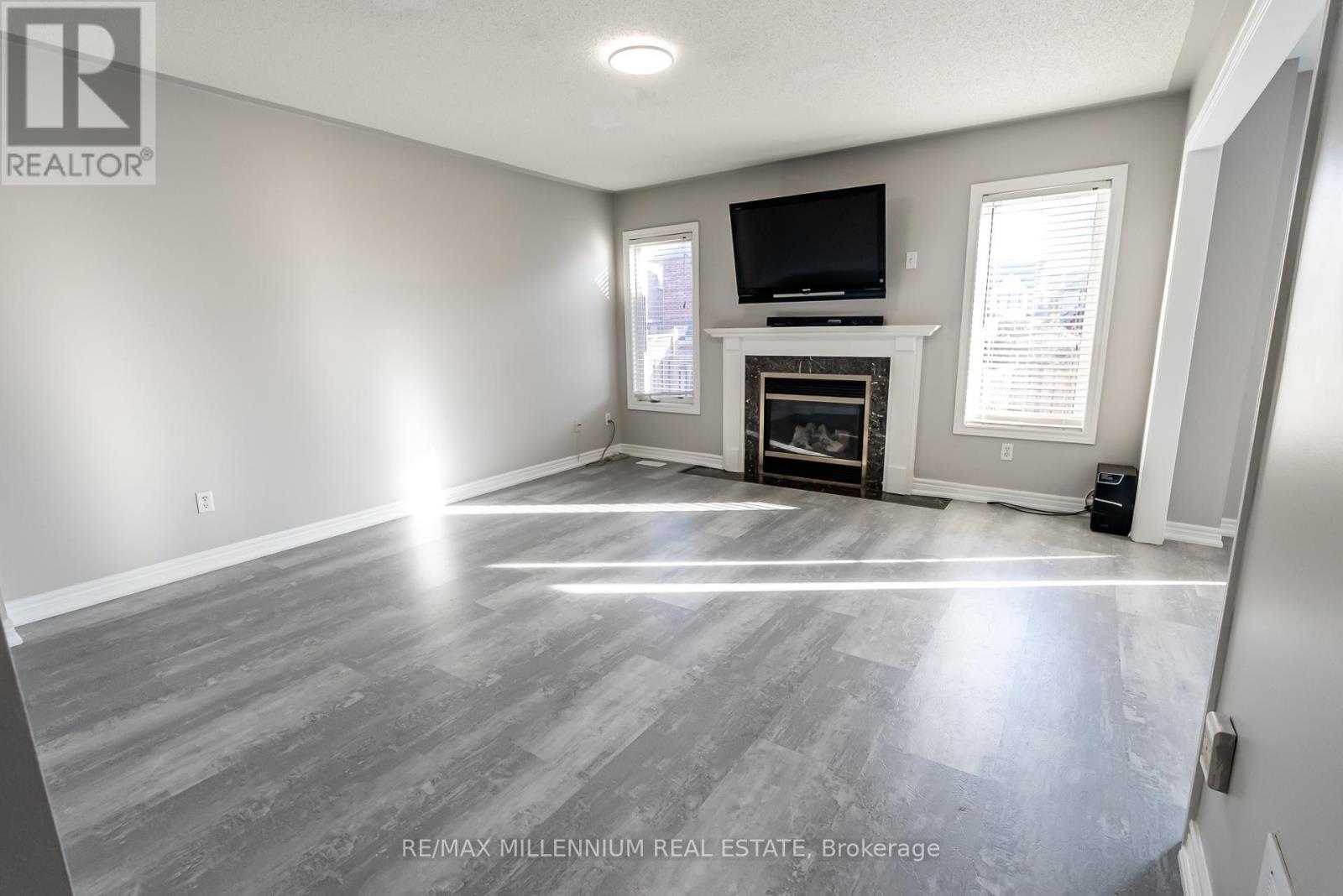 25 Bevan Crescent, Ajax, ON - Indoor Photo Showing Living Room With Fireplace
