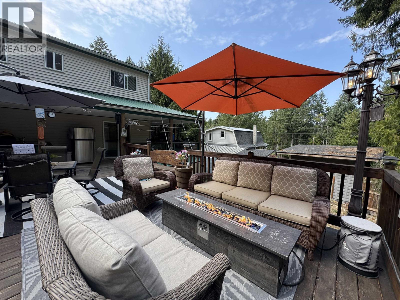 714 Charter Road, Mayne Island, BC - Outdoor With Deck Patio Veranda With Exterior