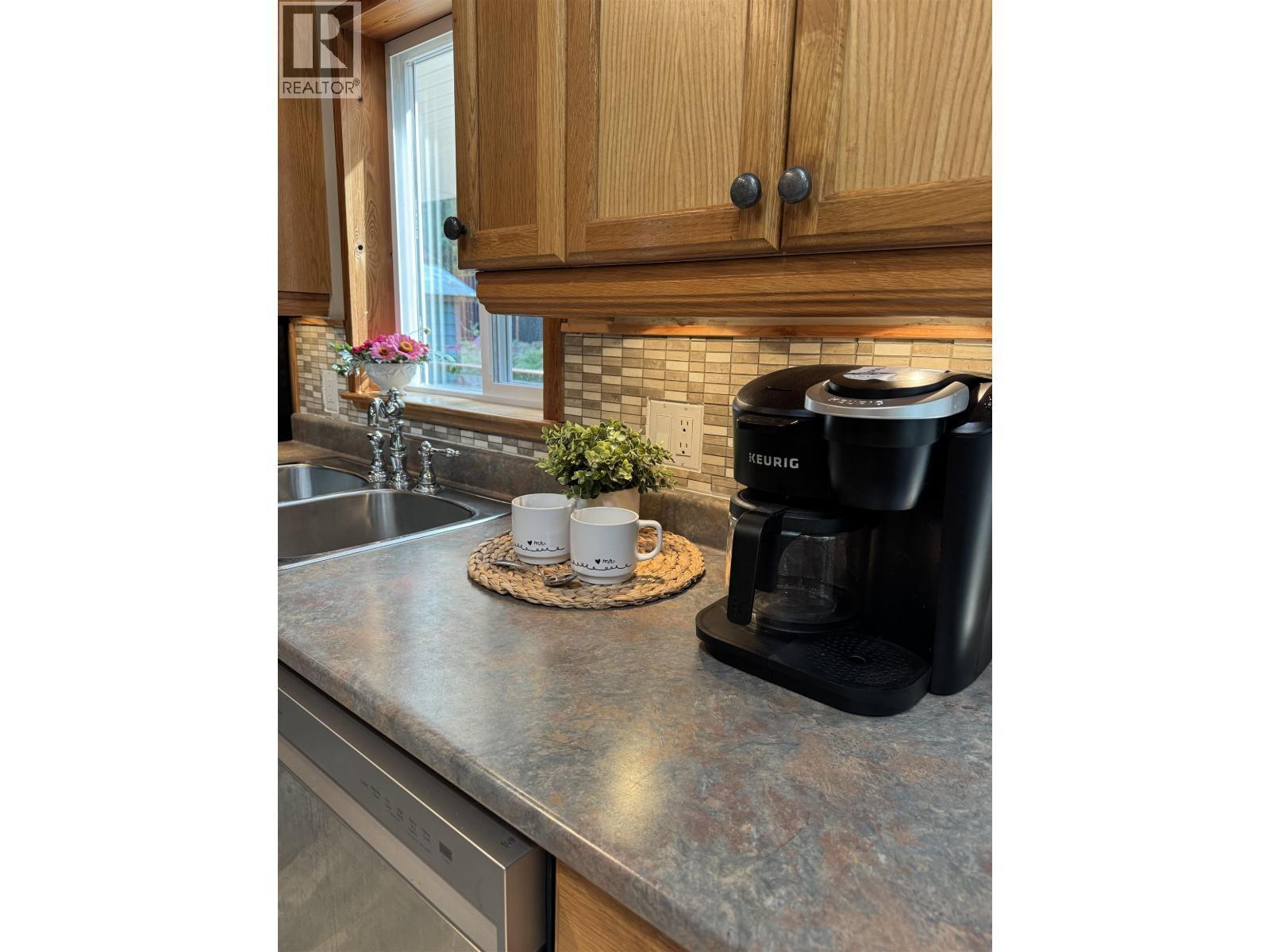 714 Charter Road, Mayne Island, BC - Indoor Photo Showing Kitchen With Double Sink