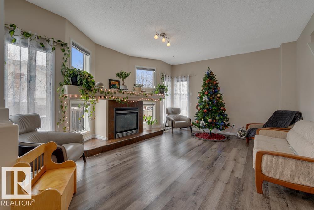 89 Erin Ridge Dr, St. Albert, AB - Indoor Photo Showing Living Room With Fireplace
