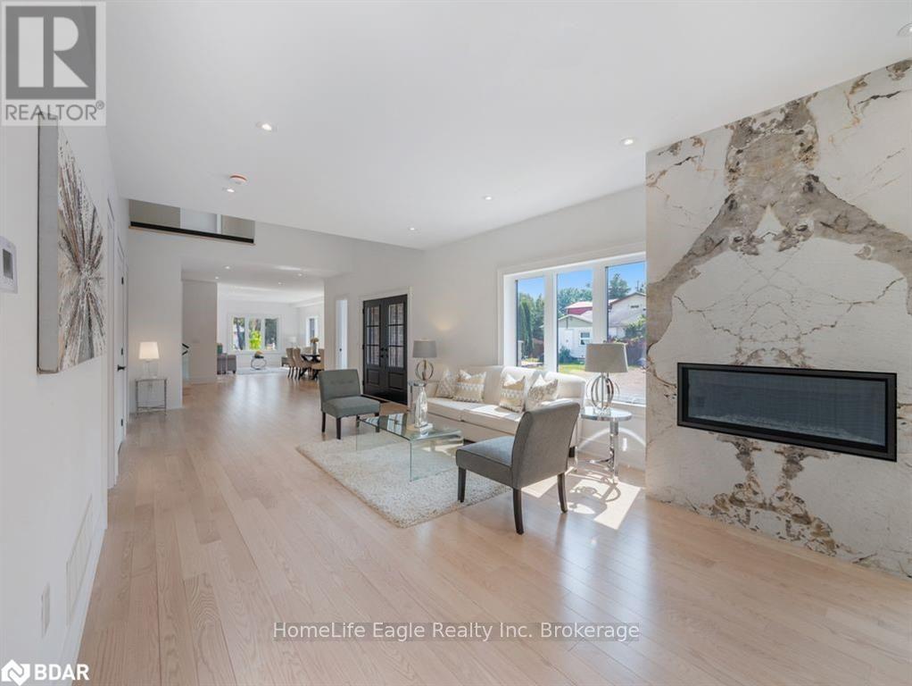 1242 Killarney Beach Road, Innisfil, ON - Indoor Photo Showing Living Room With Fireplace