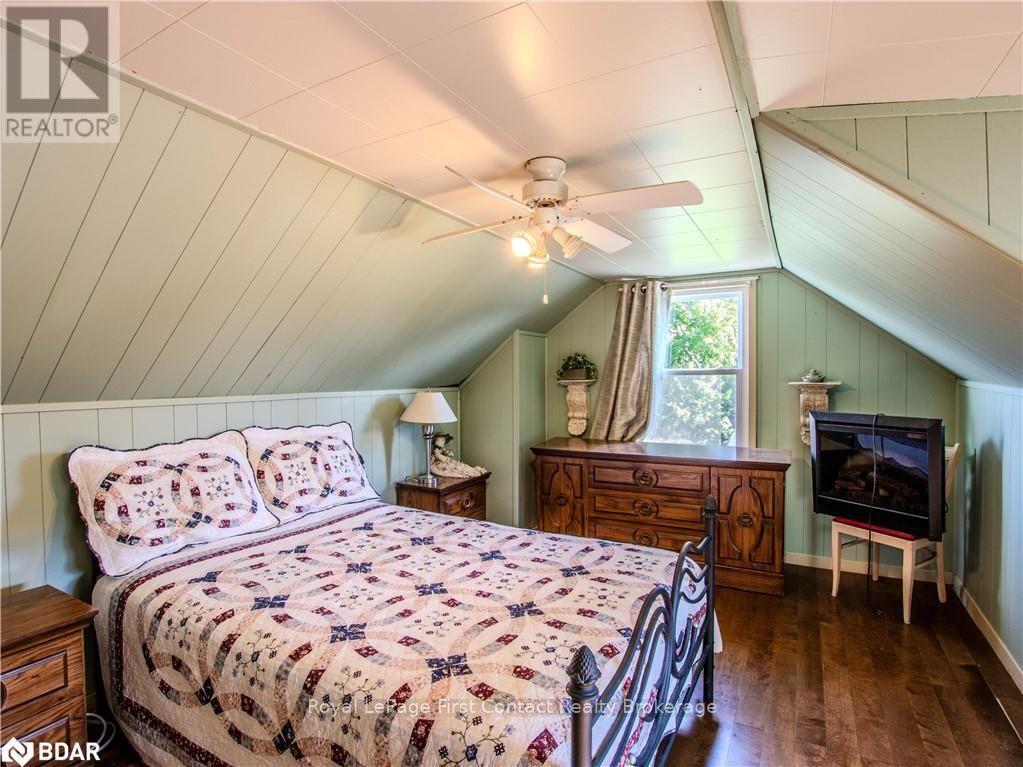 2041 Flos Rd Four Road W, Springwater, ON - Indoor Photo Showing Bedroom