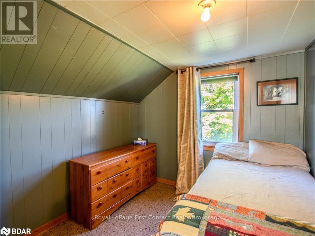 2041 Flos Rd Four Road W, Springwater, ON - Indoor Photo Showing Bedroom