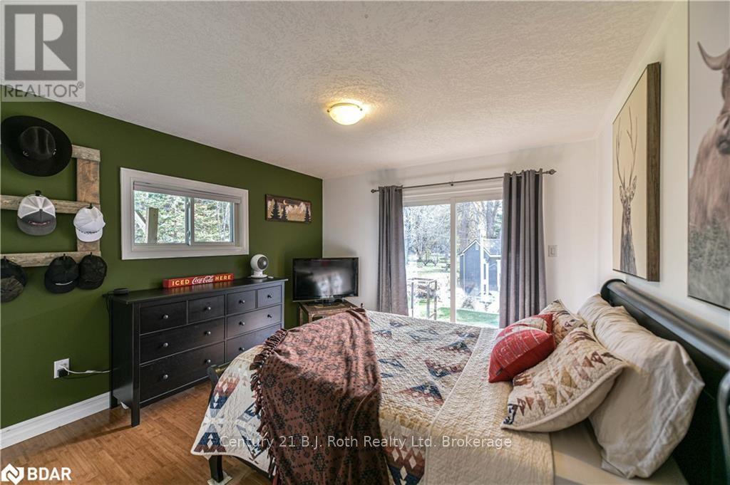 8222 County Rd 169 Road, Severn, ON - Indoor Photo Showing Bedroom