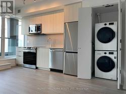 Ensuite full size white washer/dryer -