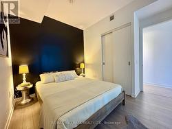 Noir accent wall sets the mood -