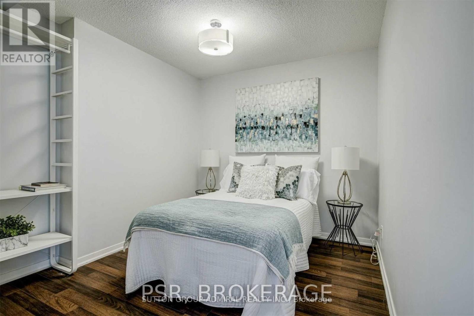 520 - 20 Joe Shuster Way, Toronto, ON - Indoor Photo Showing Bedroom