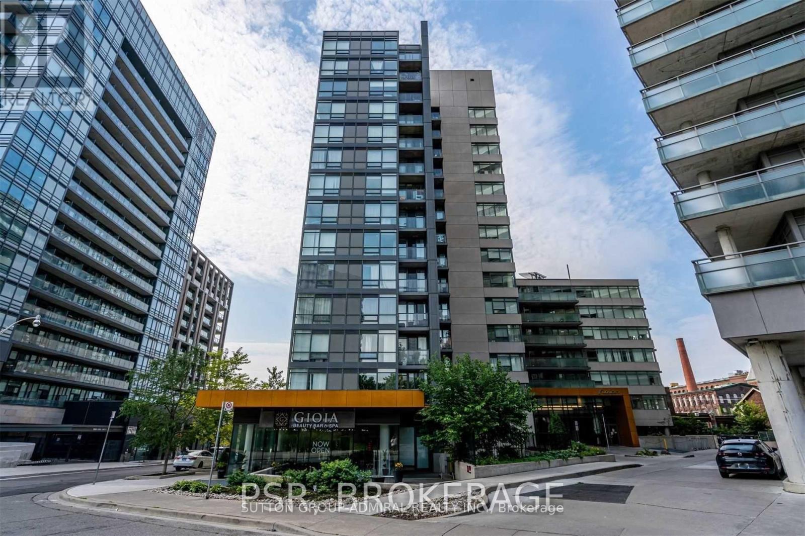 520 - 20 Joe Shuster Way, Toronto, ON - Outdoor With Balcony With Facade