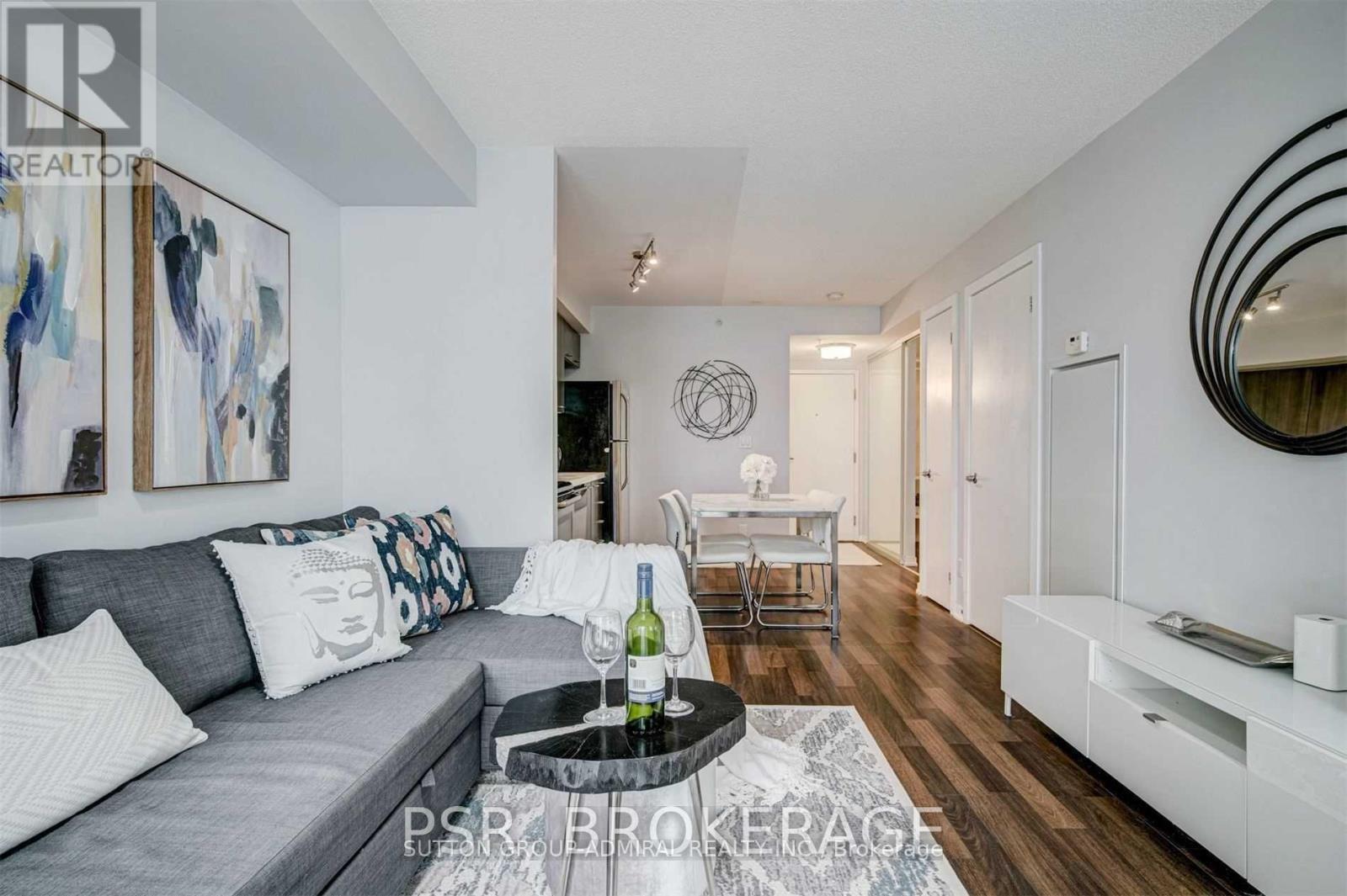 520 - 20 Joe Shuster Way, Toronto, ON - Indoor Photo Showing Living Room