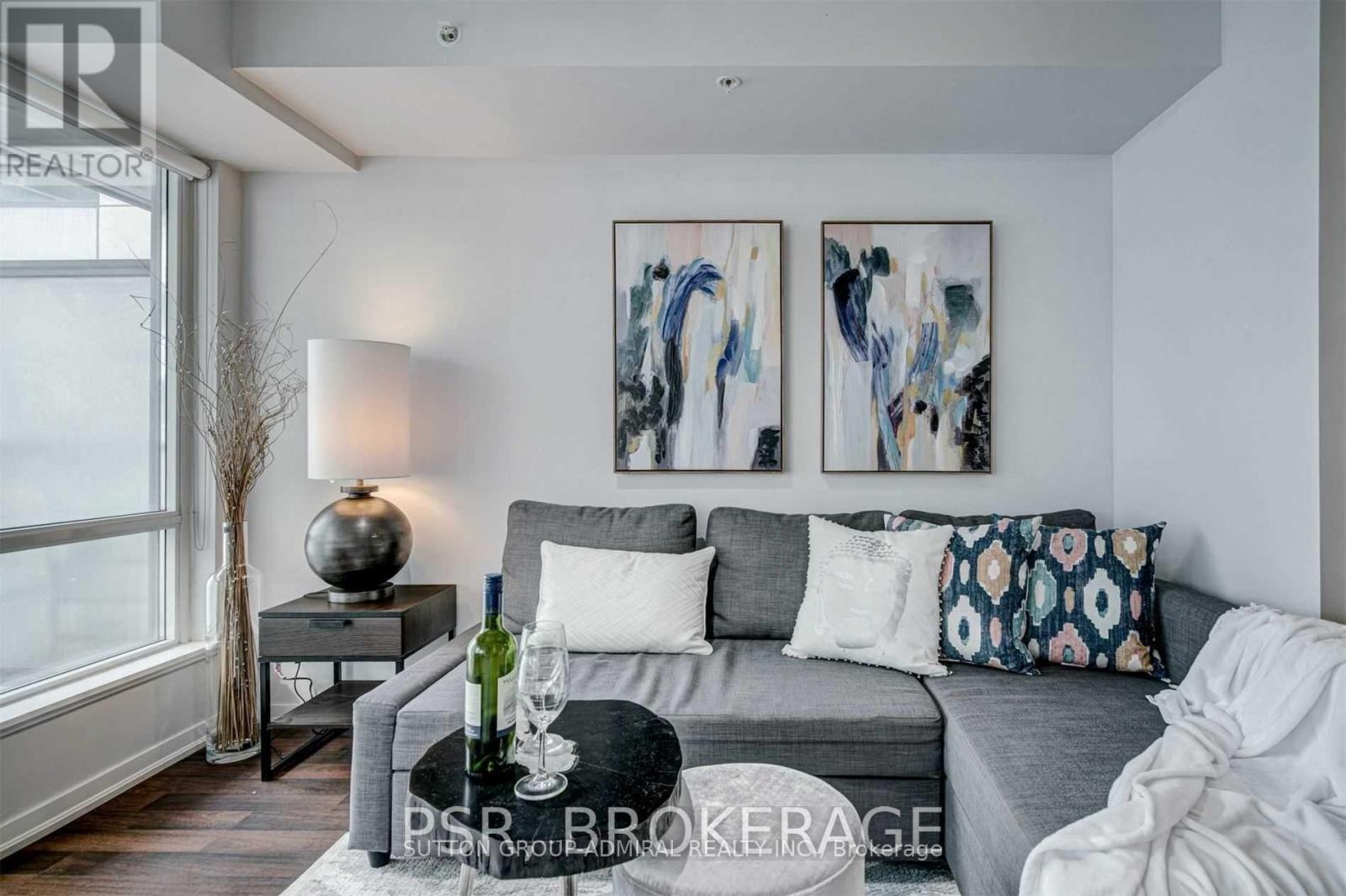 520 - 20 Joe Shuster Way, Toronto, ON - Indoor Photo Showing Living Room