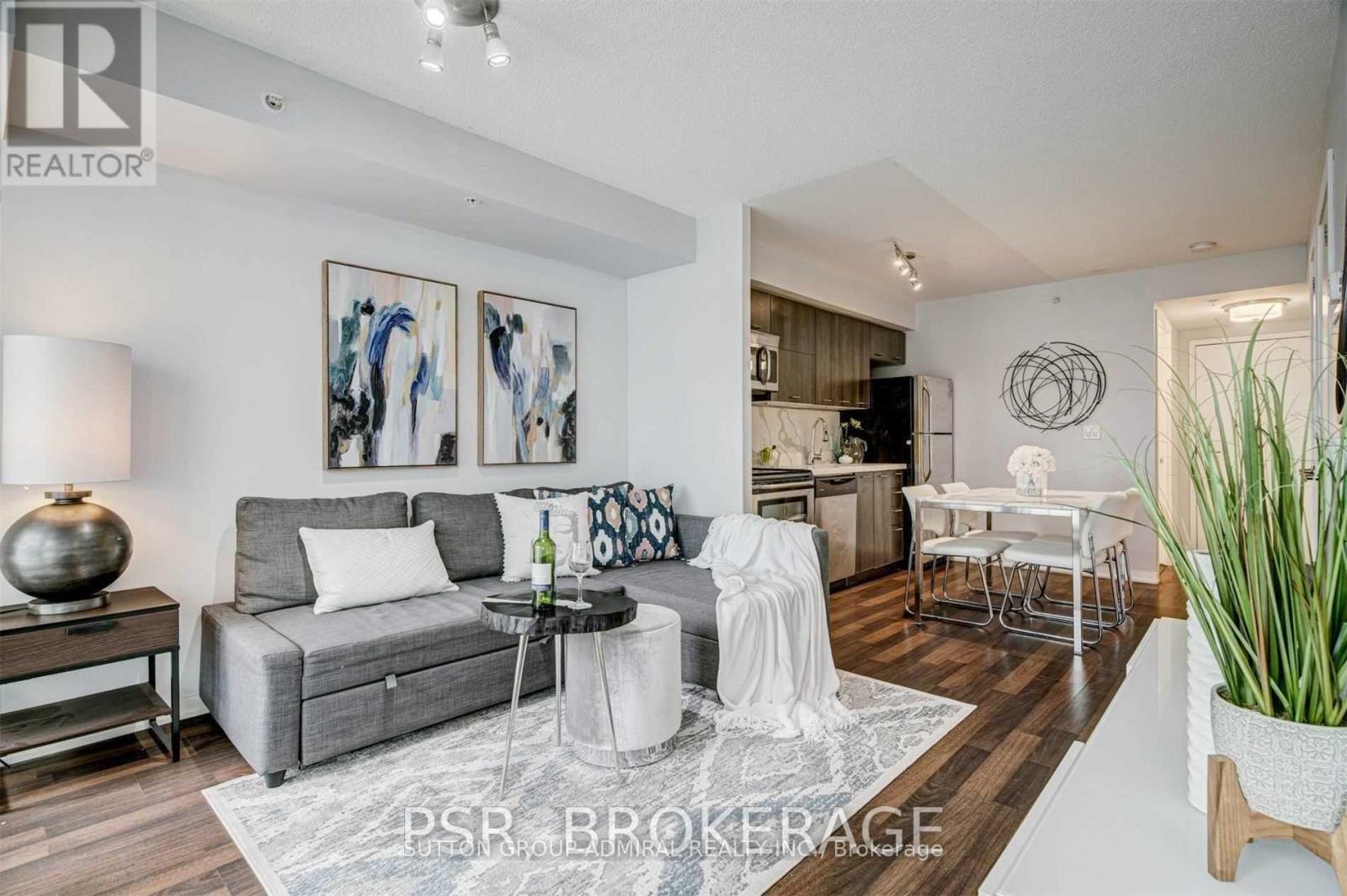 520 - 20 Joe Shuster Way, Toronto, ON - Indoor Photo Showing Living Room