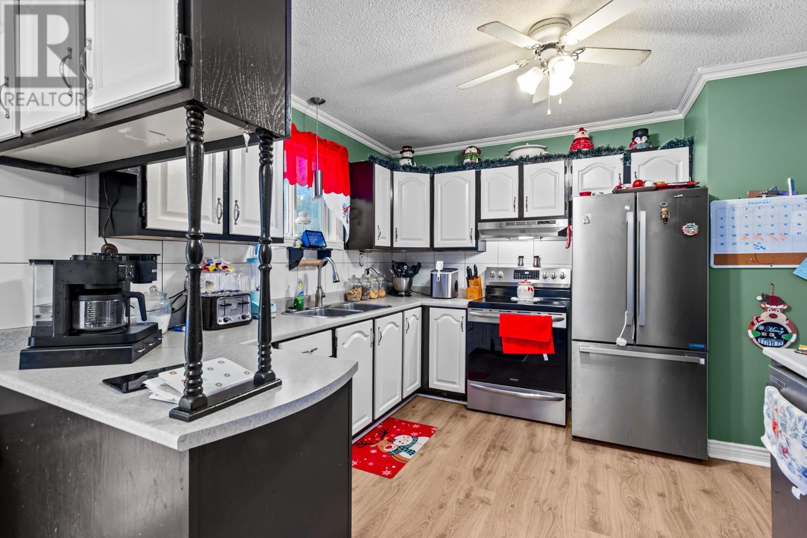 929 Pouch Cove Line, Pouch Cove, NL - Indoor Photo Showing Kitchen With Double Sink