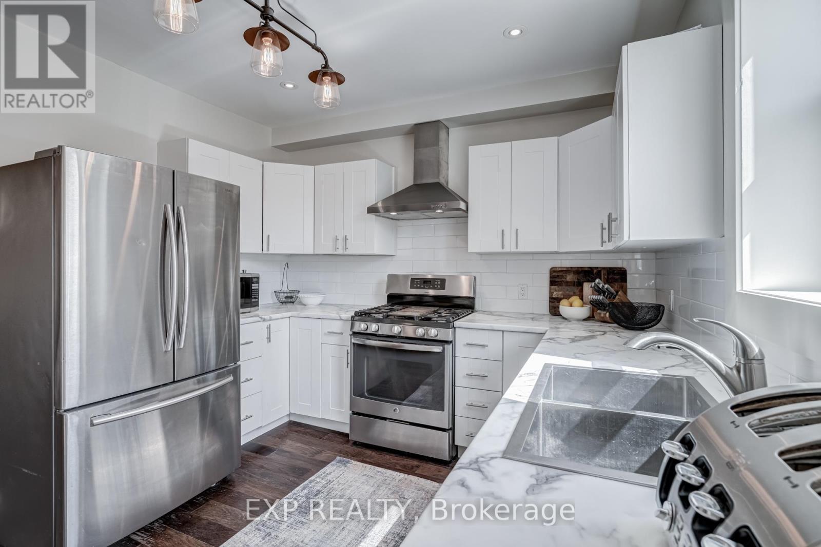 14 Milton Avenue, Hamilton, ON - Indoor Photo Showing Kitchen With Stainless Steel Kitchen With Double Sink