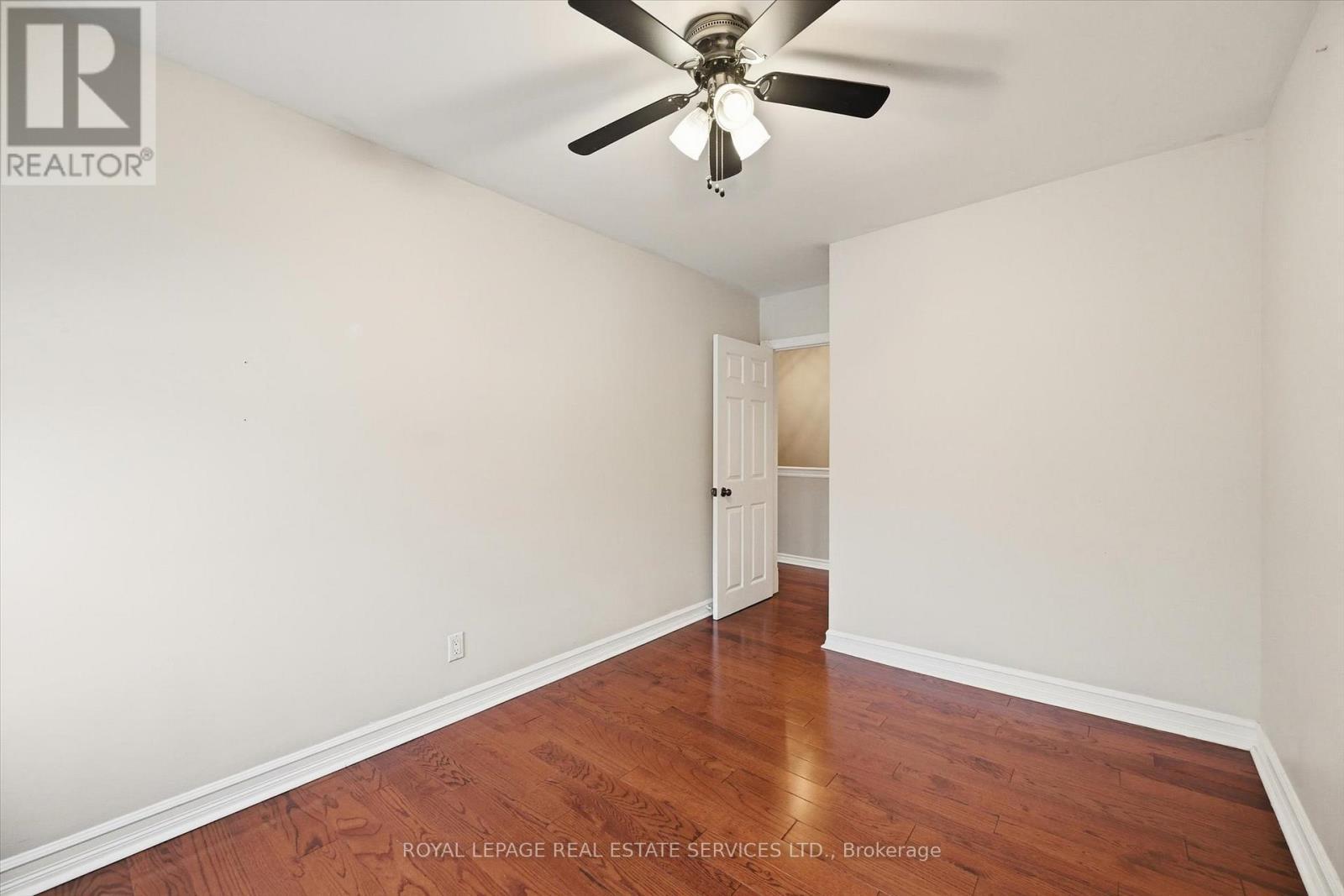 Third Bedroom w/Ceiling Fan and Hardwood Flooring - 2299 Wiseman Court, Mississauga, ON - Indoor Photo Showing Other Room