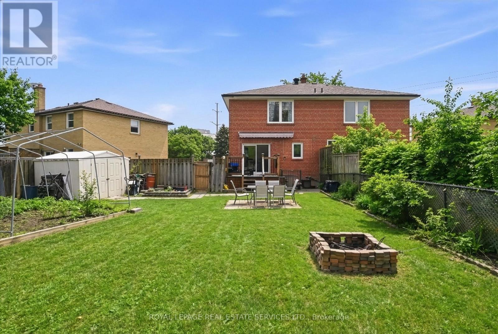 Oversized, Fenced Shared Backyard w/a Stone Patio - 2299 Wiseman Court, Mississauga, ON - Outdoor With Exterior