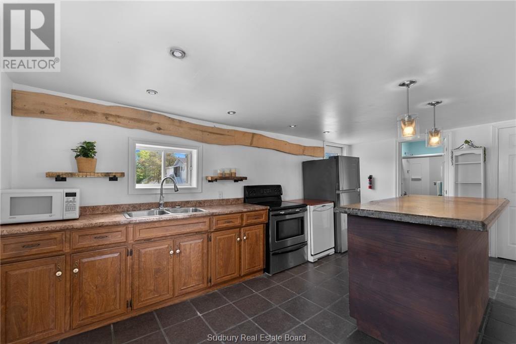 140 River Street, Massey, ON - Indoor Photo Showing Kitchen With Double Sink