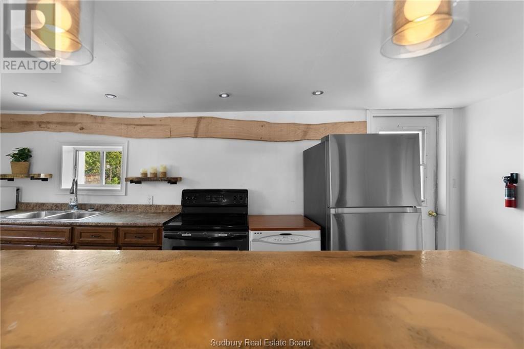 140 River Street, Massey, ON - Indoor Photo Showing Kitchen With Double Sink