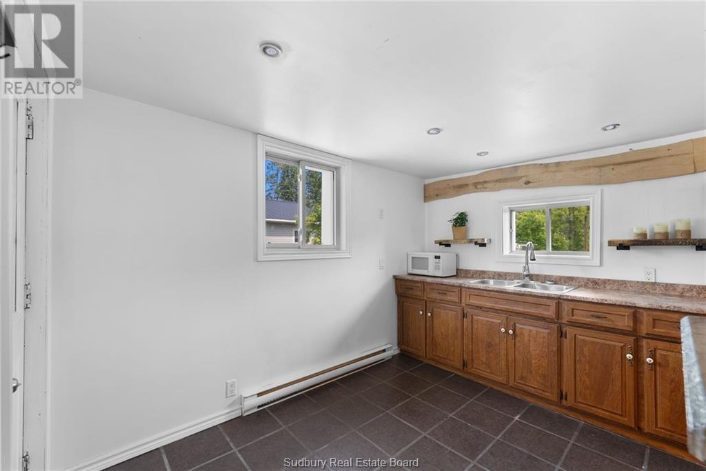 140 River Street, Massey, ON - Indoor Photo Showing Kitchen With Double Sink