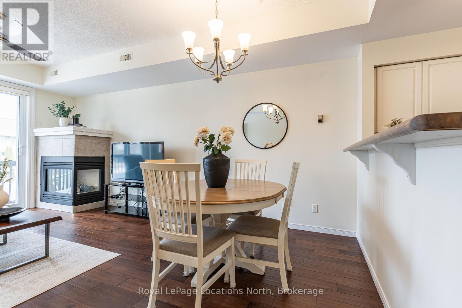 465 Mariners Way, Collingwood, ON - Indoor Photo Showing Dining Room With Fireplace