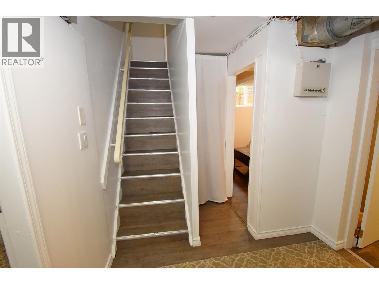 Stairs into basement - 3930 26 Street, Vernon, BC - Indoor Photo Showing Other Room