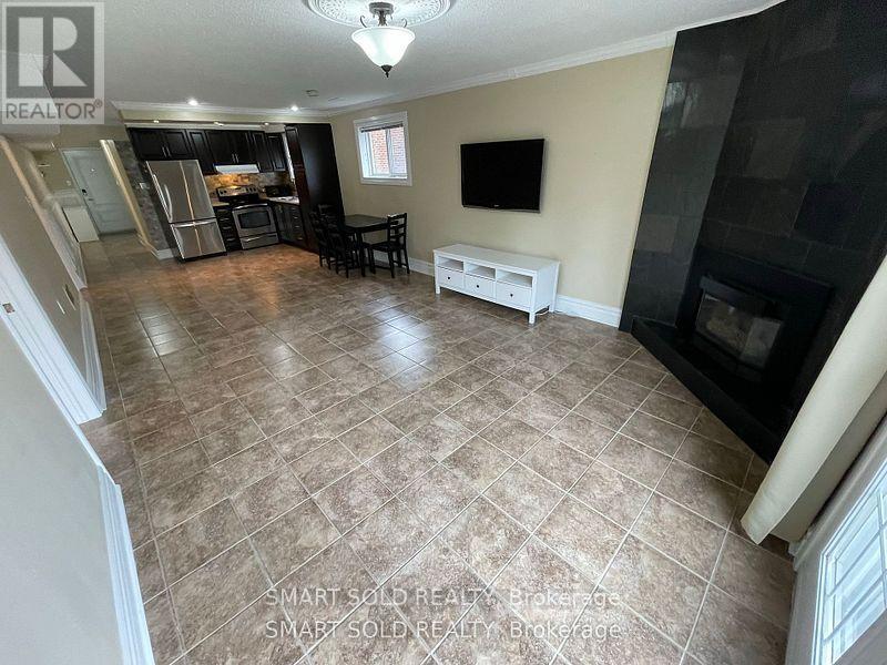 1575 Corkstone Glade, Mississauga, ON - Indoor With Fireplace