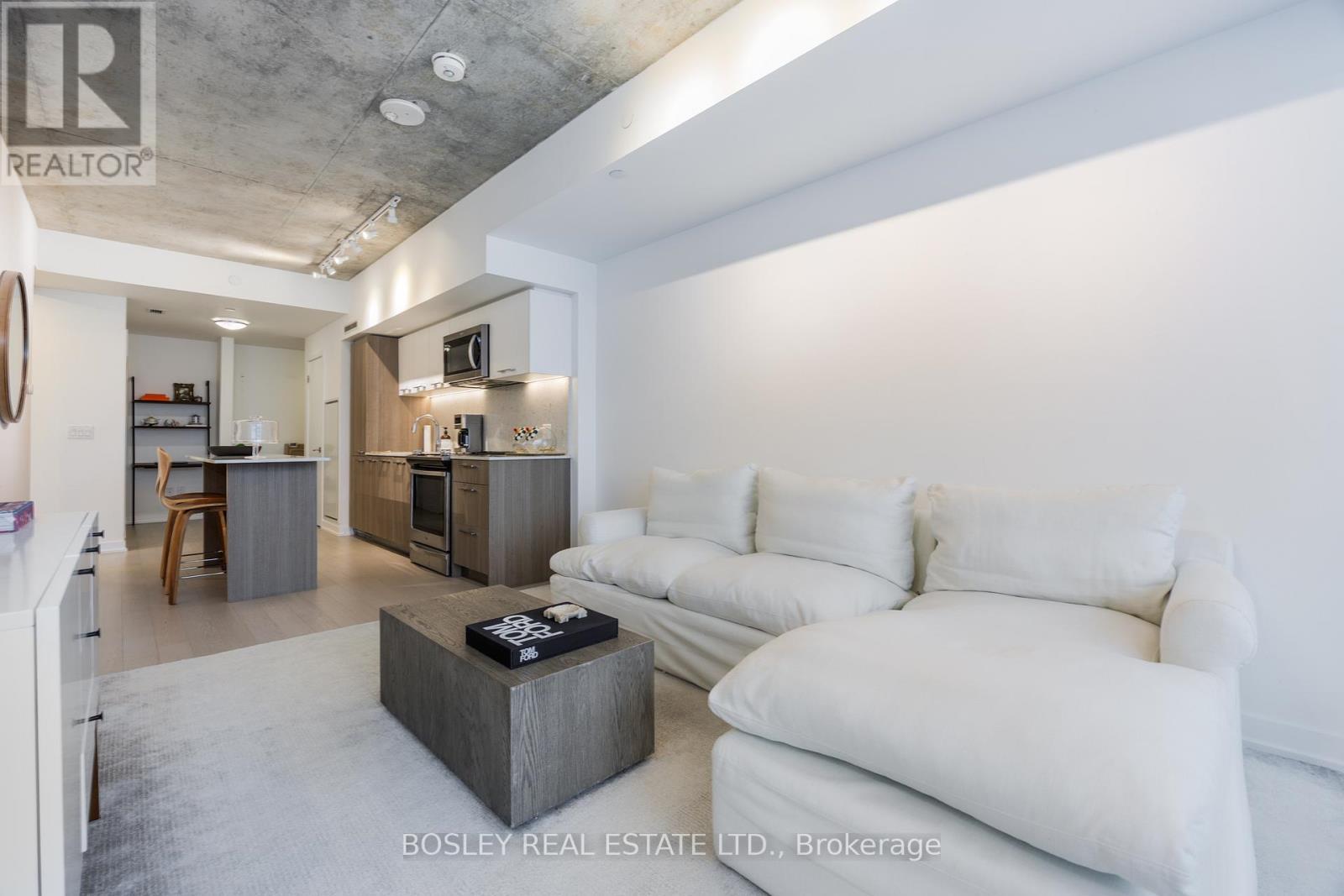 1210 - 15 Baseball Place, Toronto, ON - Indoor Photo Showing Living Room